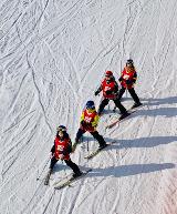 campers at ski camp with 100% shirts on